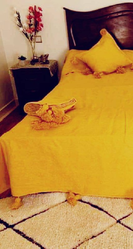Couverture marocaine à pompons